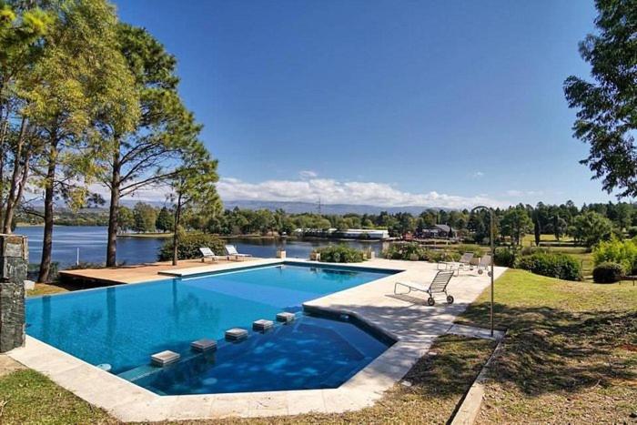 Casa exclusiva frente al lago, por RENT Lago Los Molinos